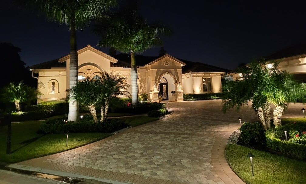 home with landscape lighting