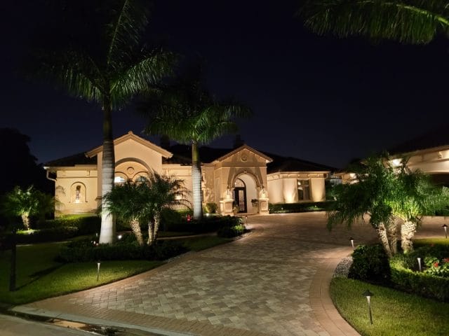 home with landscape lighting